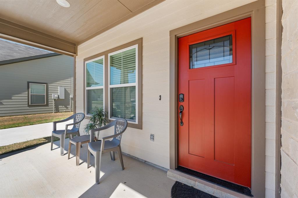 1568 Reverie Road Burleson, TX 76028 - Photo 3 of 26 a dining room with furniture and a window