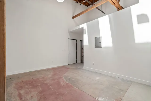 a view of a hallway with stairs