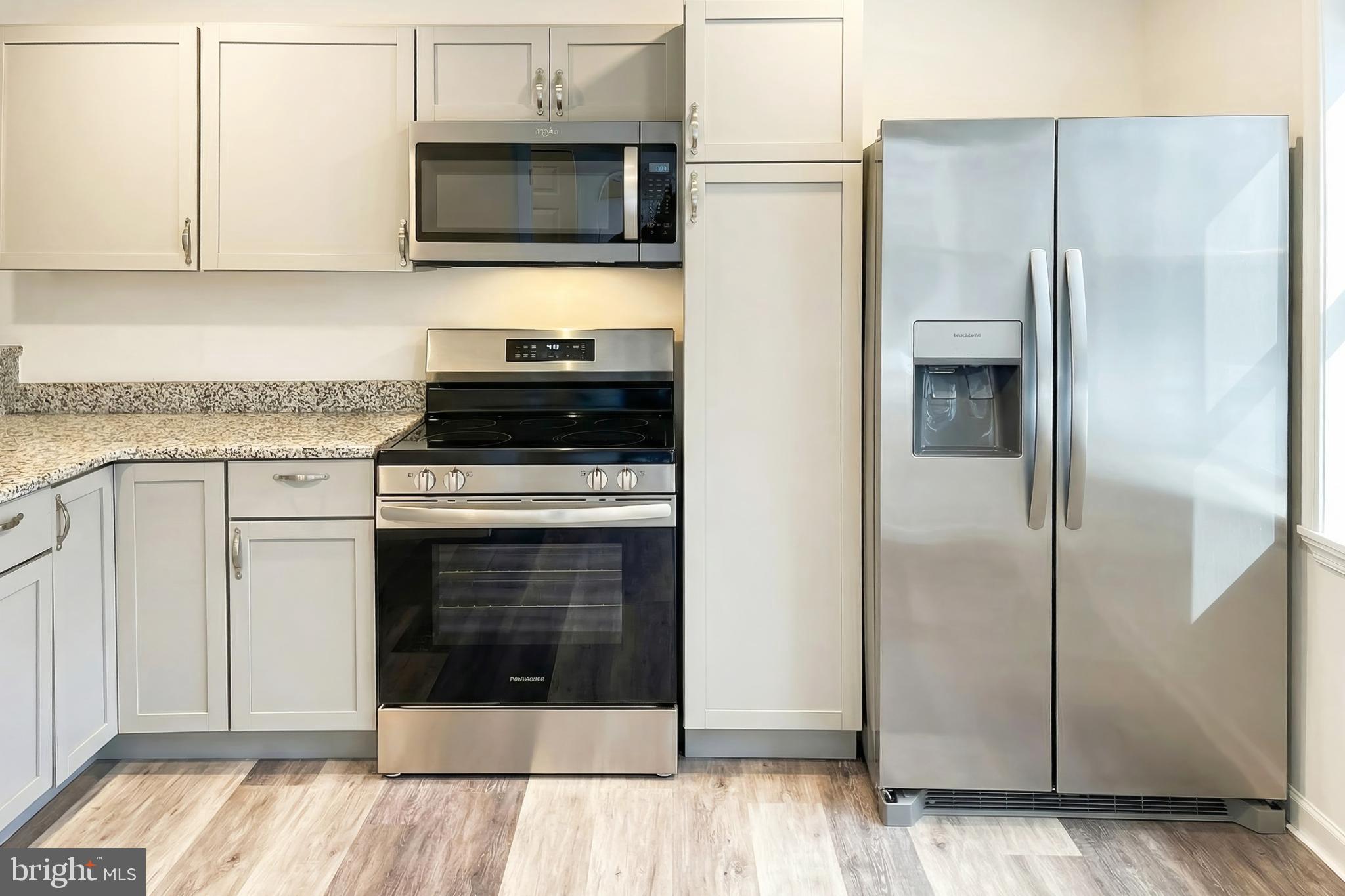1885 Stoverstown Road, Unit 9 Spring Grove, PA 17362 - Photo 12 of 29 a kitchen with a stove microwave and refrigerator