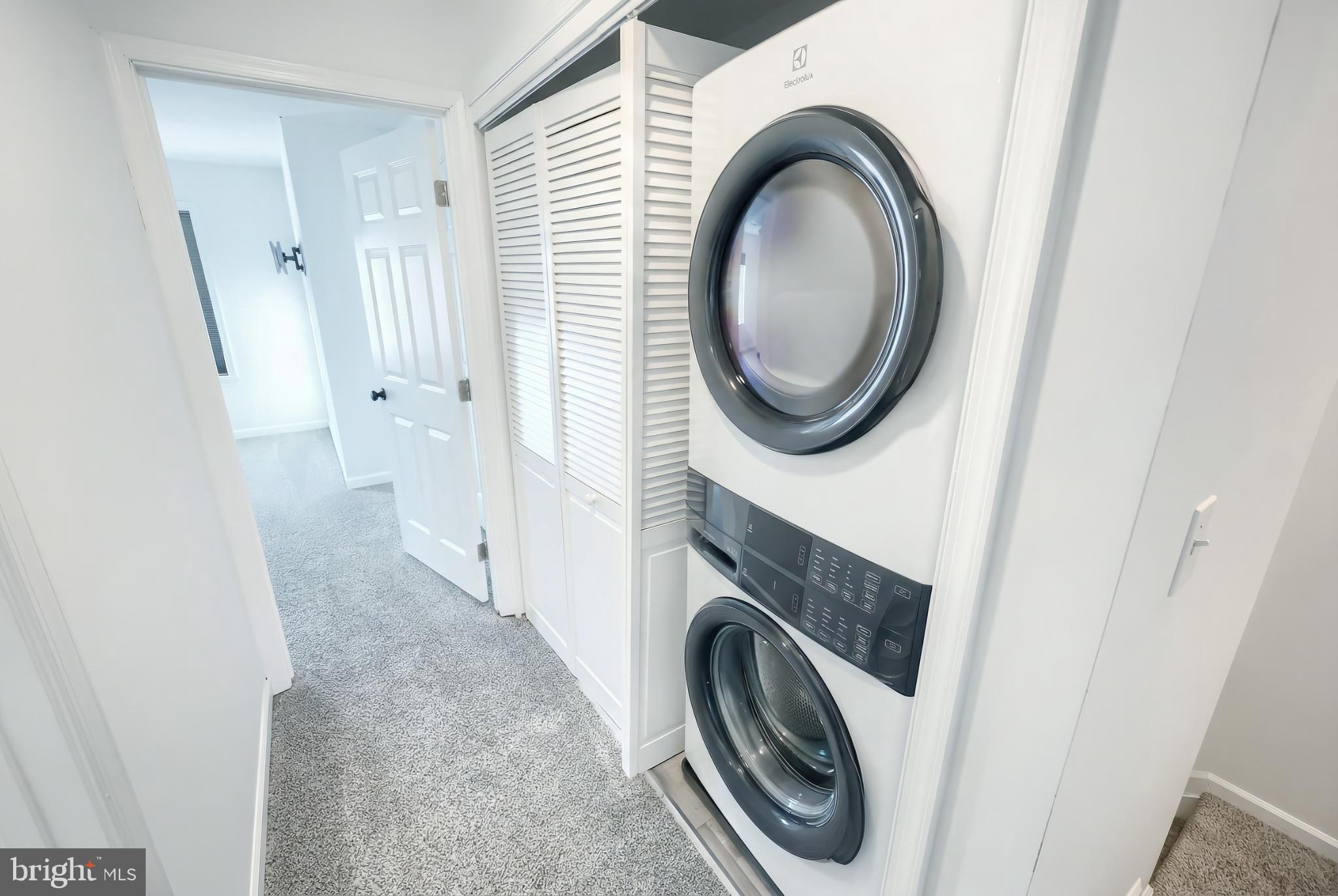 1885 Stoverstown Road, Unit 9 Spring Grove, PA 17362 - Photo 16 of 29 a view of a hallway with washer and dryer