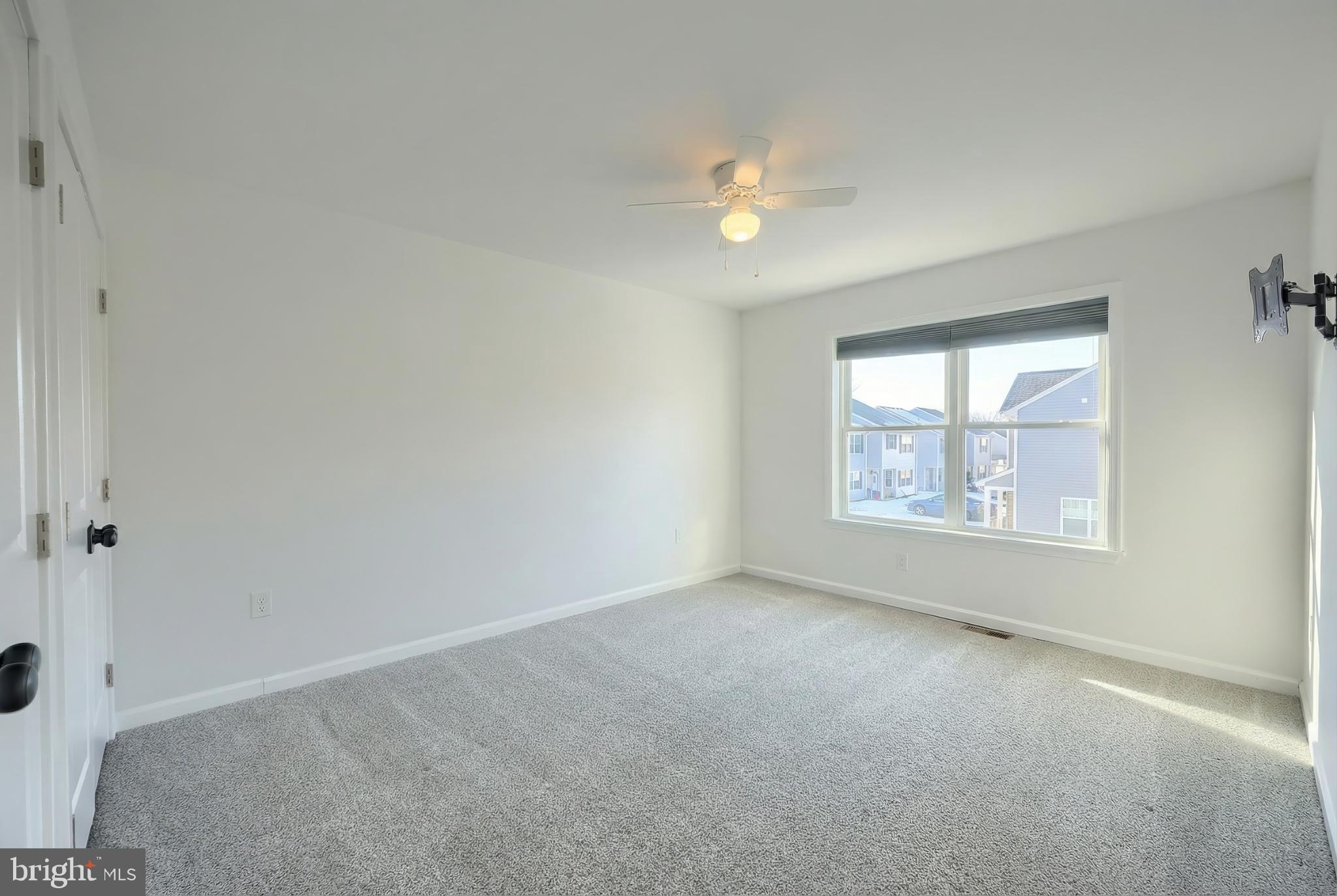 1885 Stoverstown Road, Unit 9 Spring Grove, PA 17362 - Photo 21 of 29 an empty room with windows