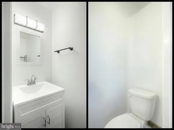 a view of an empty room and a ceiling fan