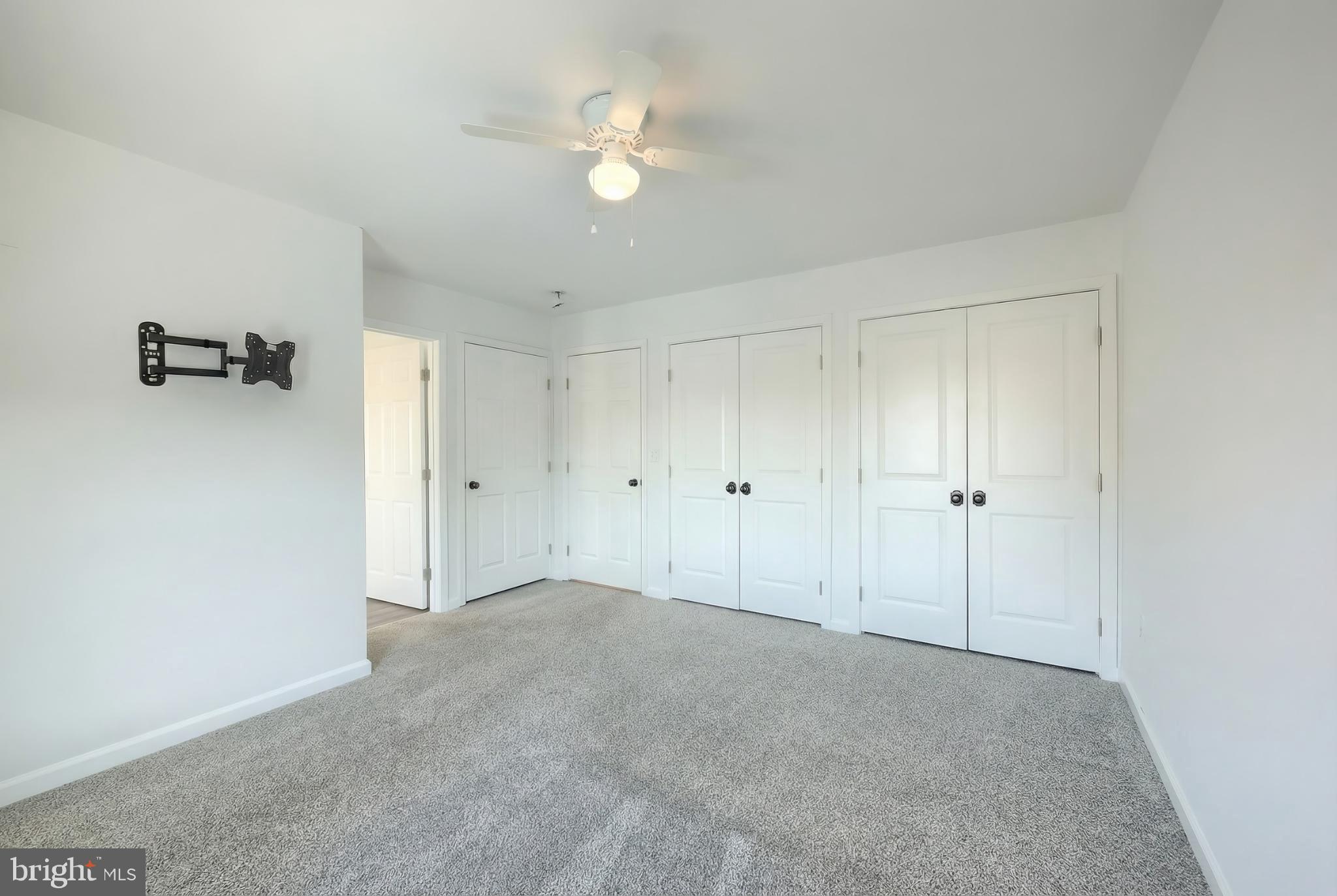 1885 Stoverstown Road, Unit 9 Spring Grove, PA 17362 - Photo 25 of 29 a view of an empty room and a ceiling fan