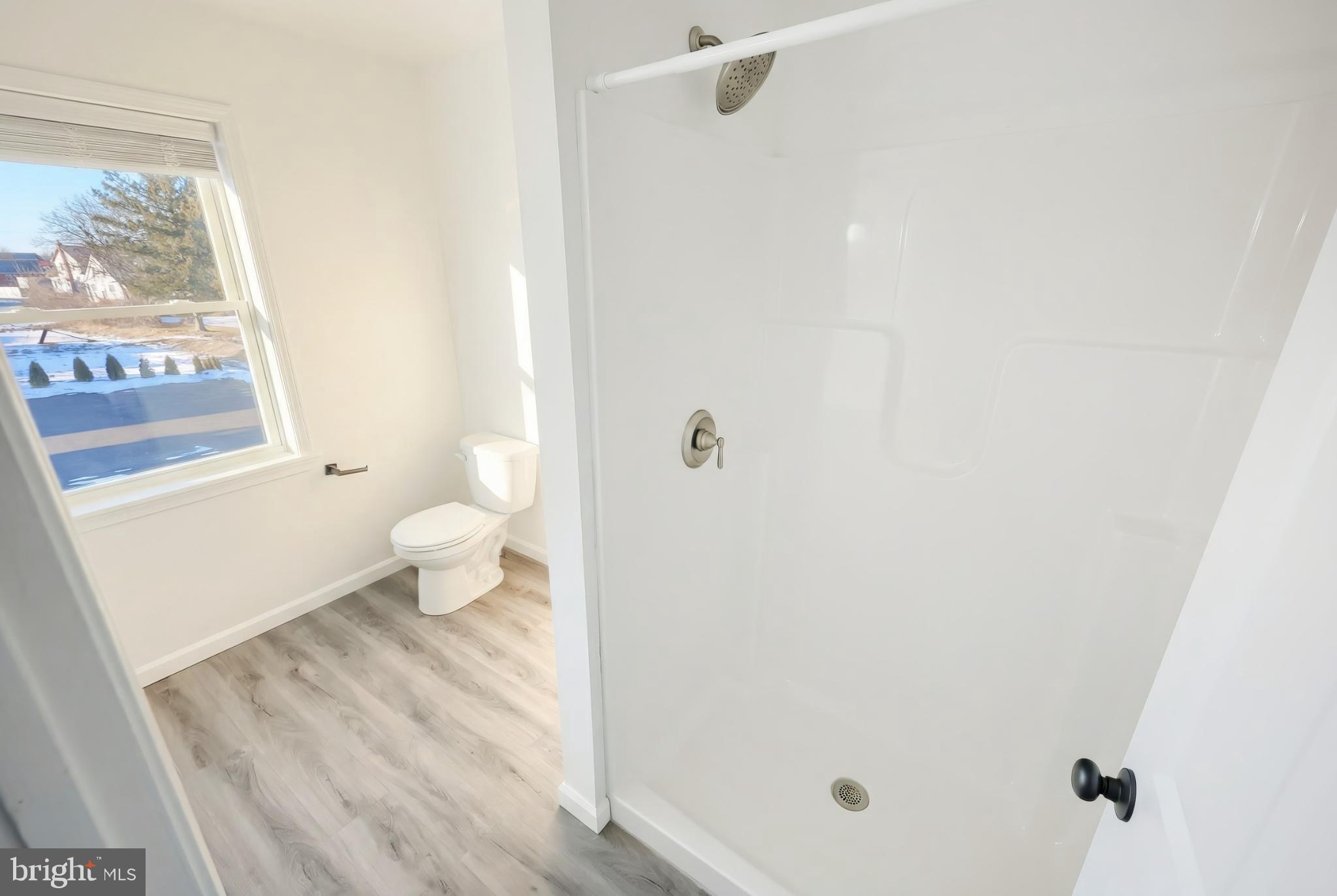 1885 Stoverstown Road, Unit 9 Spring Grove, PA 17362 - Photo 26 of 29 a bathroom with a toilet and a shower