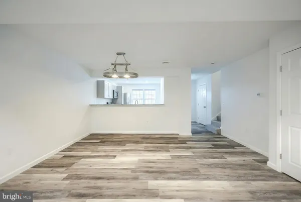 a kitchen with a stove microwave and refrigerator