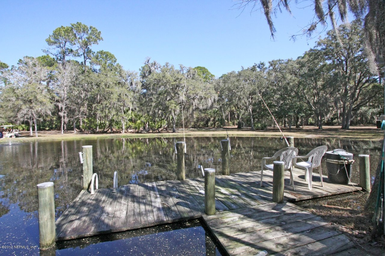 587 West River Road Palatka, FL 32177 - Photo 33 of 35 Stocked Pond and Dock