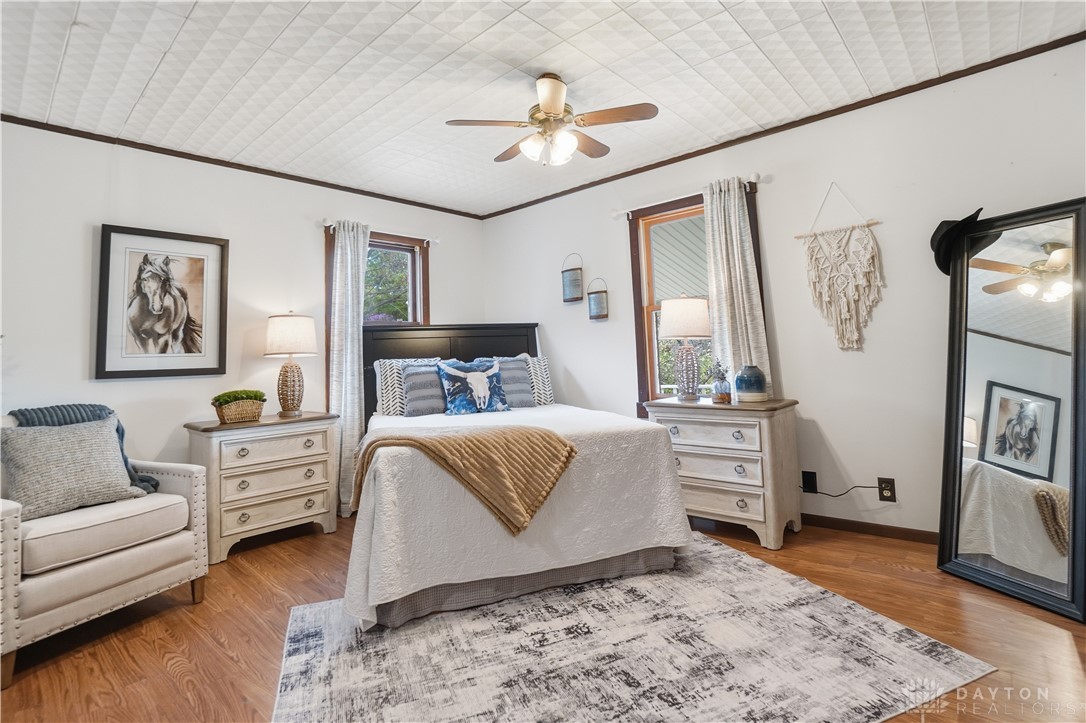 7553 Coffin Station Road Springfield, OH 45502 - Photo 55 of 95 This cozy bedroom features durable wood flooring and abundant natural light.