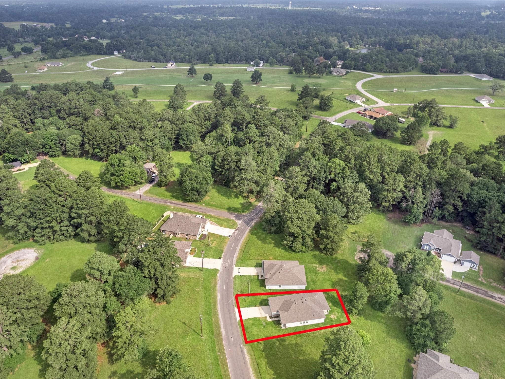 46 Fairway Drive Trinity, TX 75862 - Photo 24 of 26 an aerial view of residential houses with outdoor space and lake view