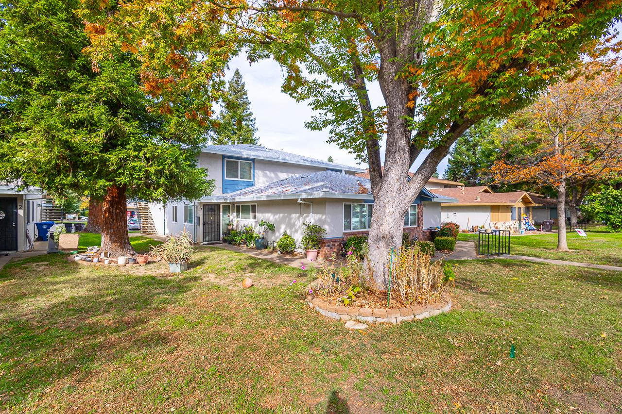 a front view of a house with swimming pool