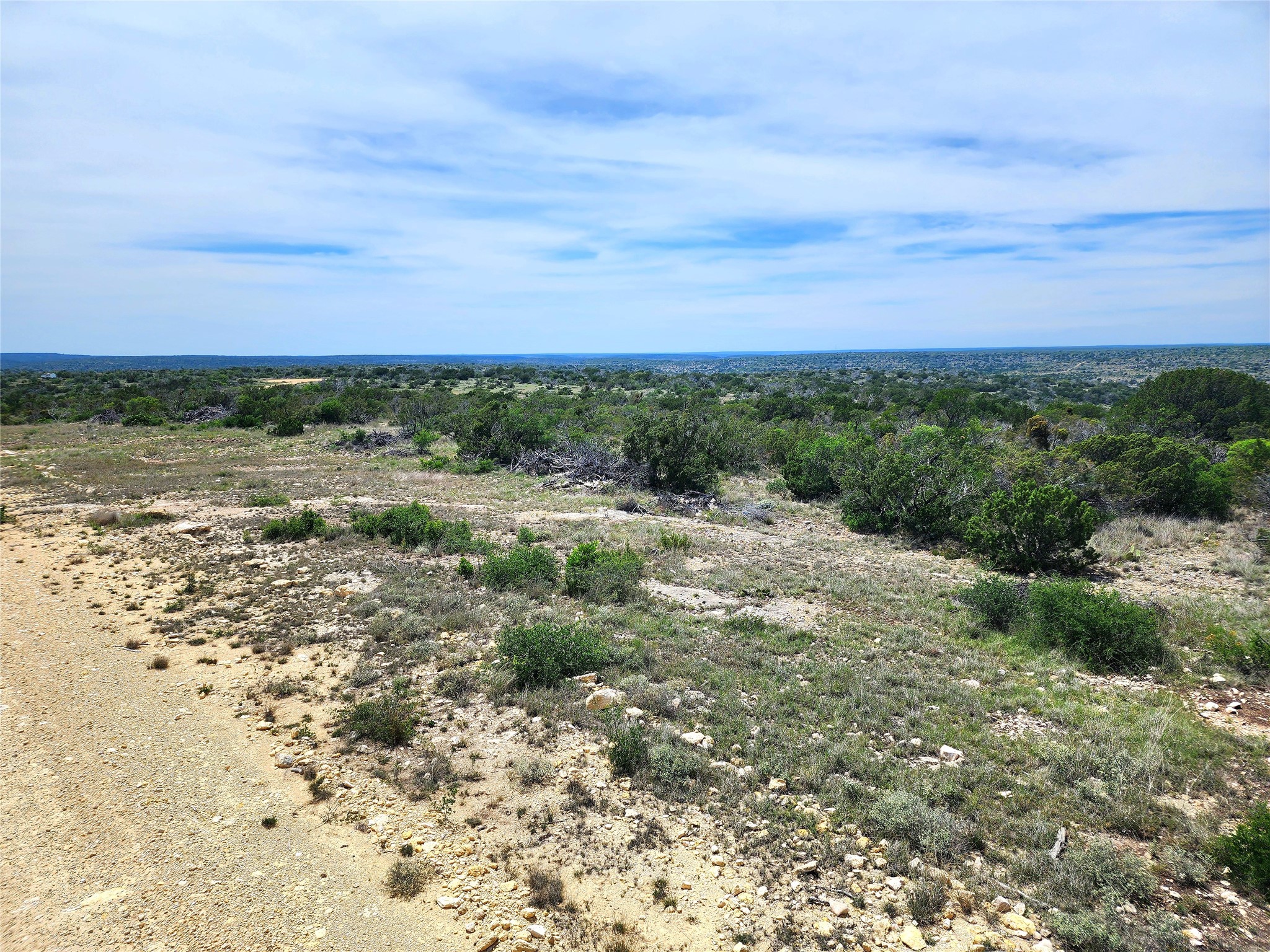 0 Peck Road Comstock, TX 78837 - Photo 5 of 24 a view of a field with an ocean