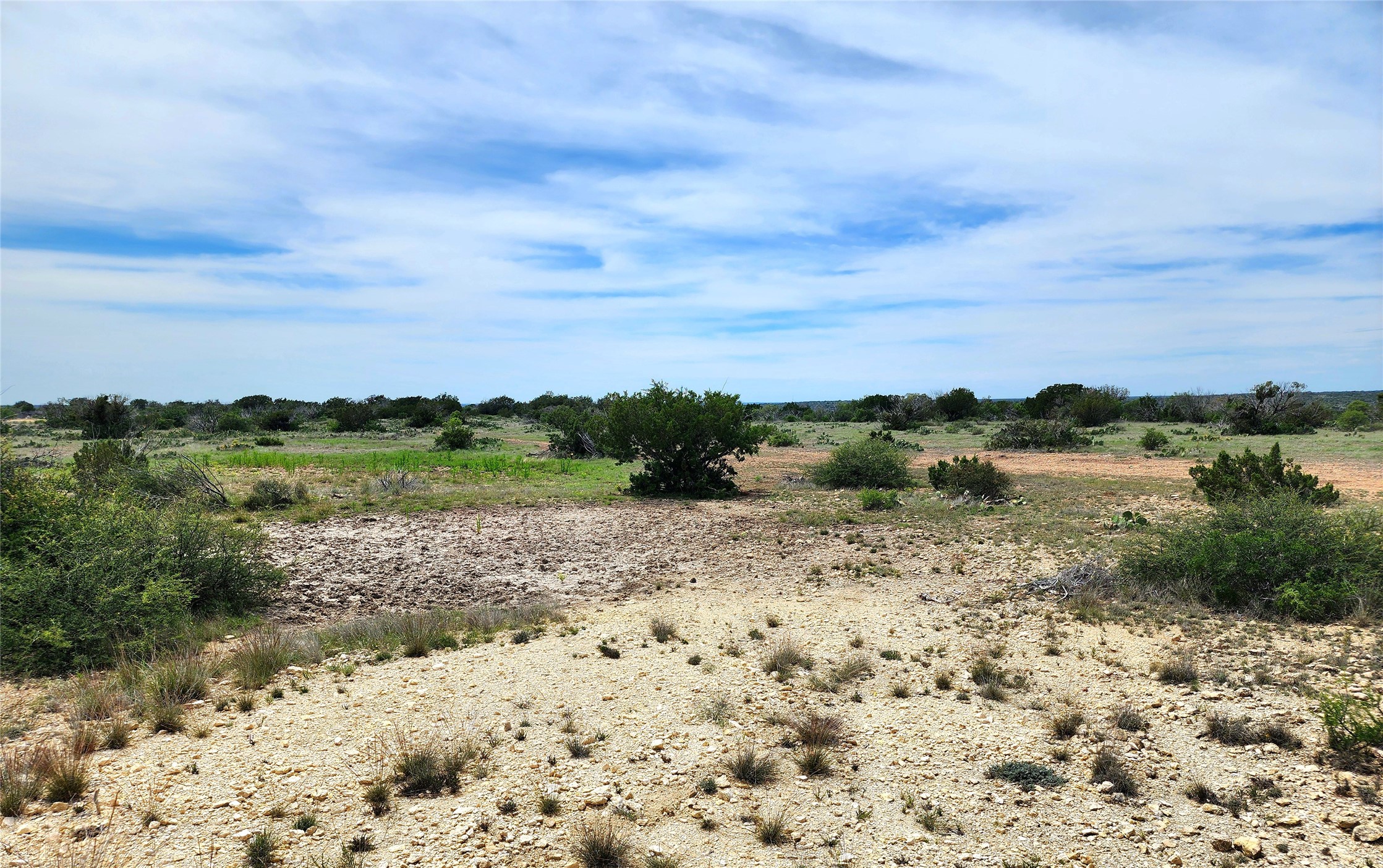 0 Peck Road Comstock, TX 78837 - Photo 10 of 24 a view of lake with mountain in the background
