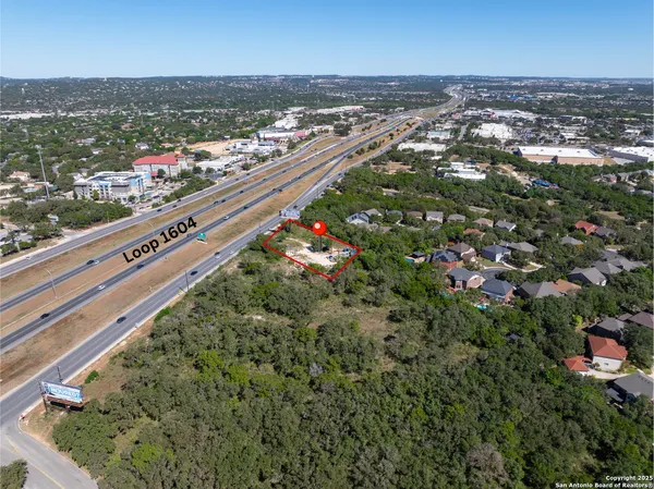 an aerial view of city and lake