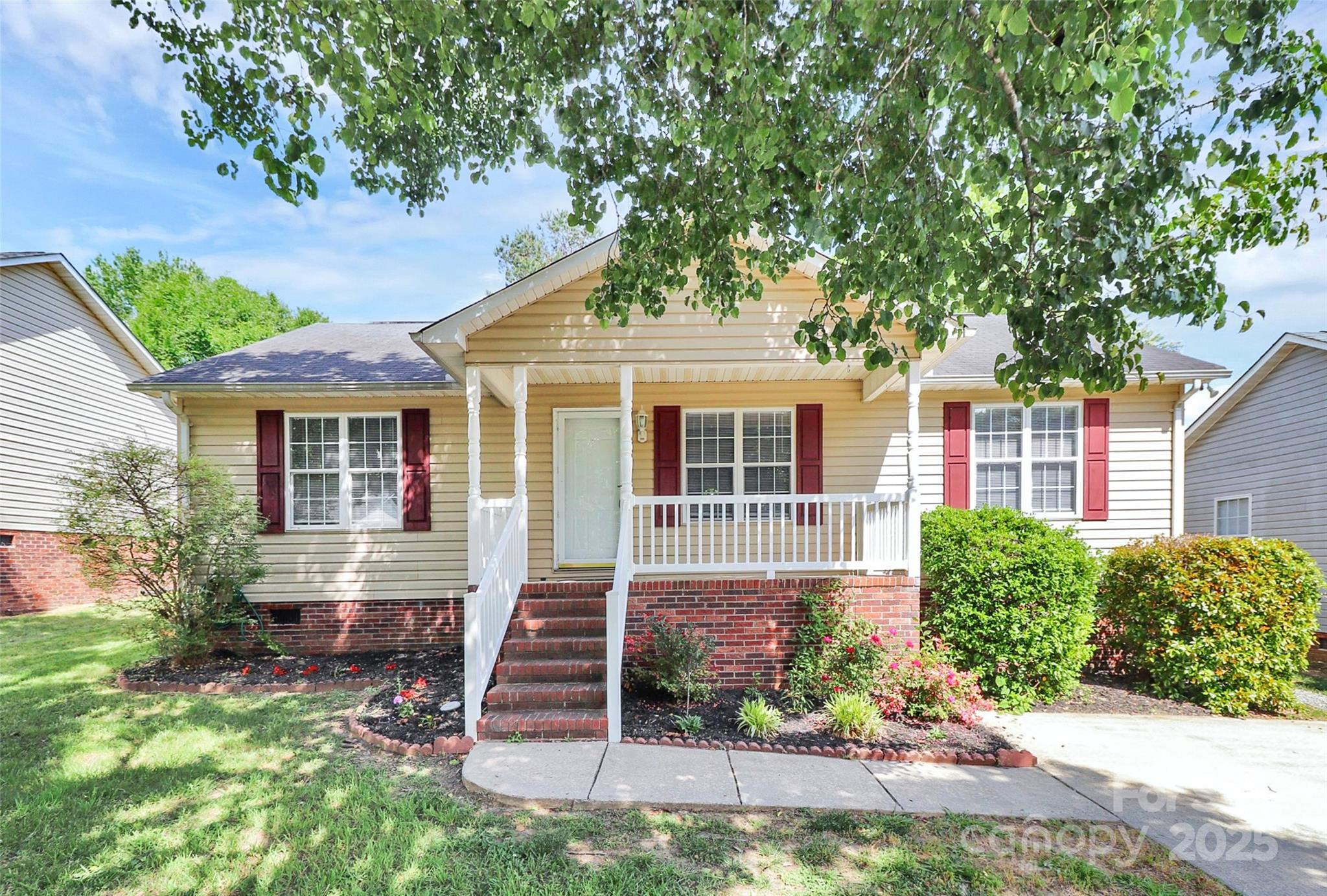 5114 Daffodil Lane Concord, NC 28025 - Photo 1 of 30 front view of a house with a yard