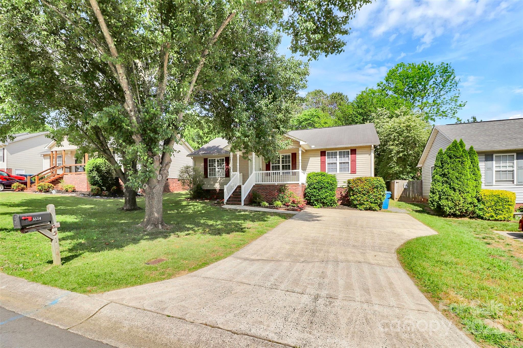 5114 Daffodil Lane Concord, NC 28025 - Photo 2 of 30 front view of a house with a yard