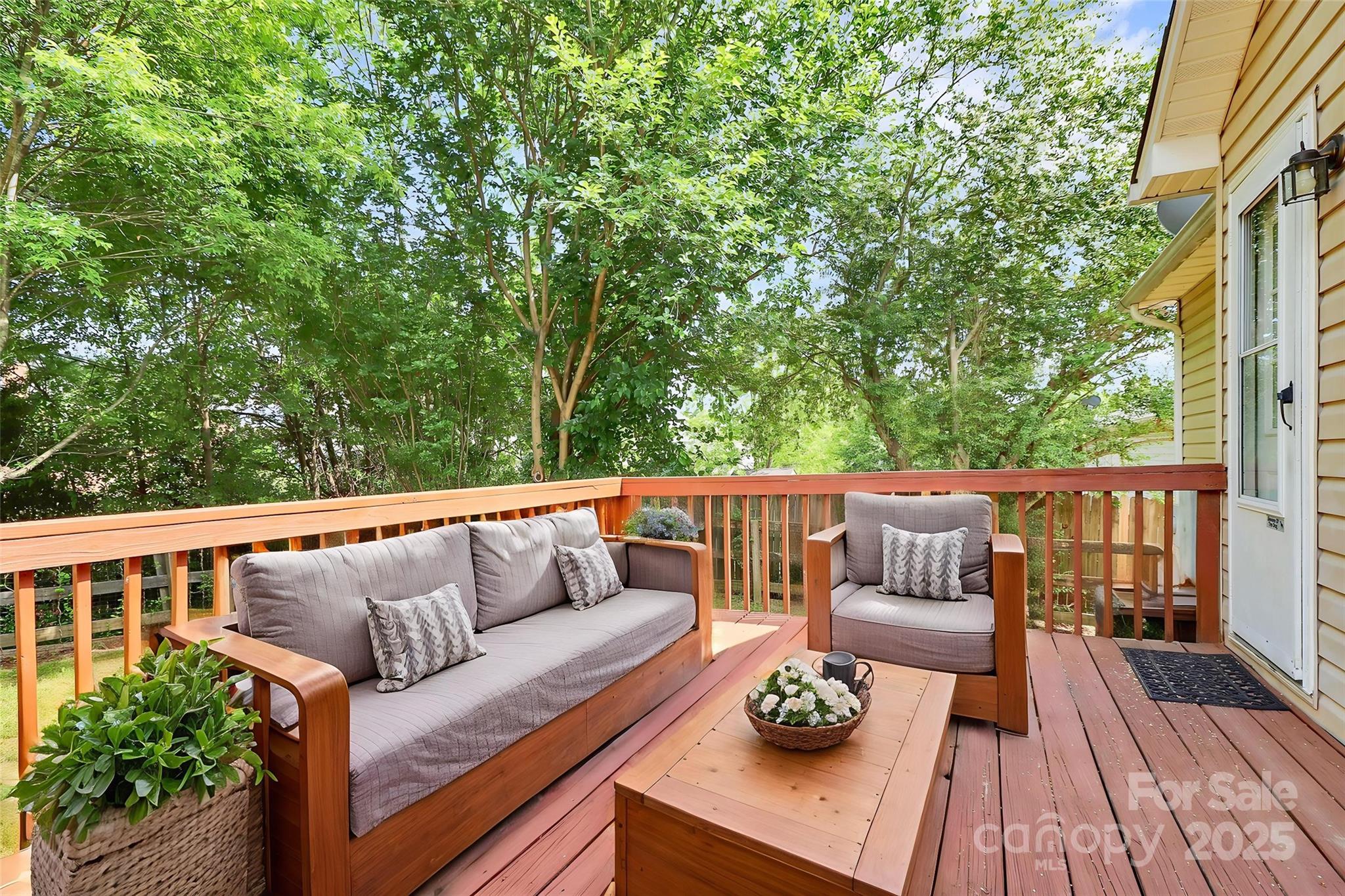 5114 Daffodil Lane Concord, NC 28025 - Photo 24 of 30 a balcony with wooden floor and outdoor seating