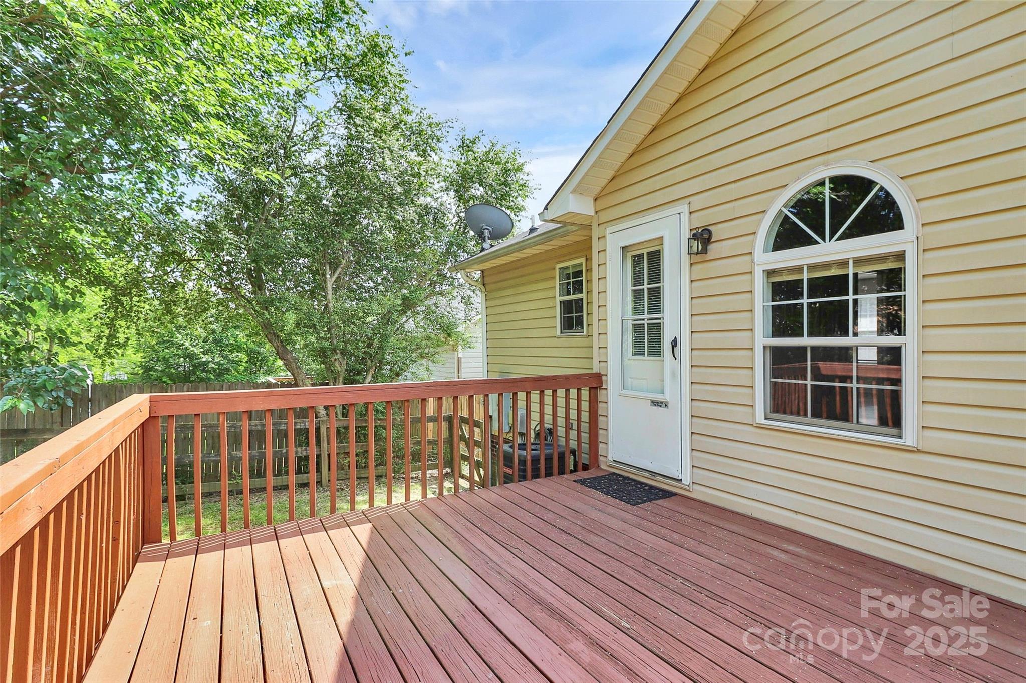 5114 Daffodil Lane Concord, NC 28025 - Photo 26 of 30 a view of a house with a deck