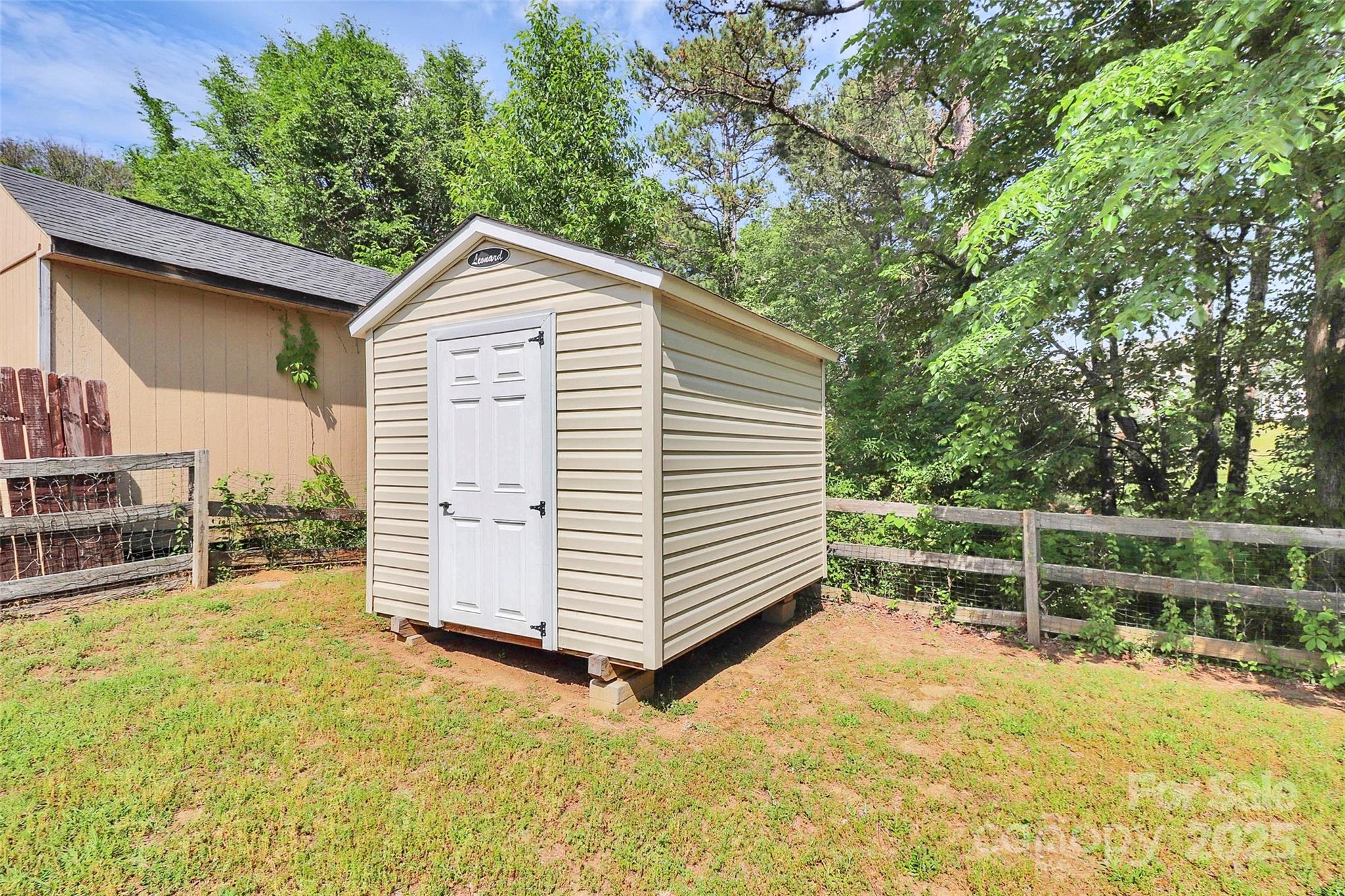 5114 Daffodil Lane Concord, NC 28025 - Photo 28 of 30 a view of house with backyard and seating area
