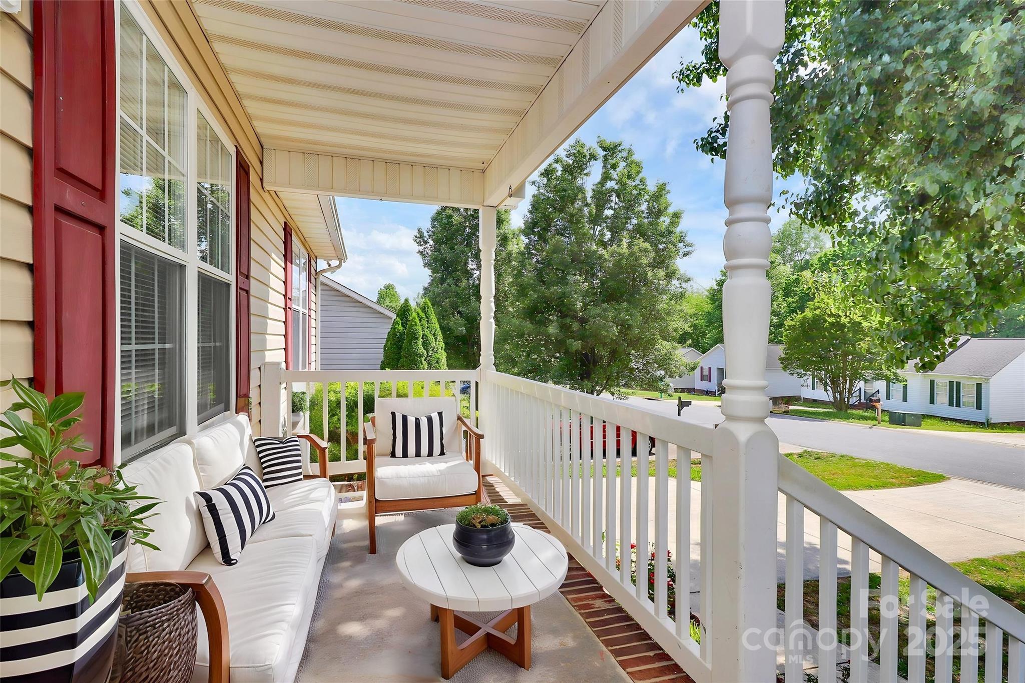 5114 Daffodil Lane Concord, NC 28025 - Photo 3 of 30 a view of a chair and table in the balcony