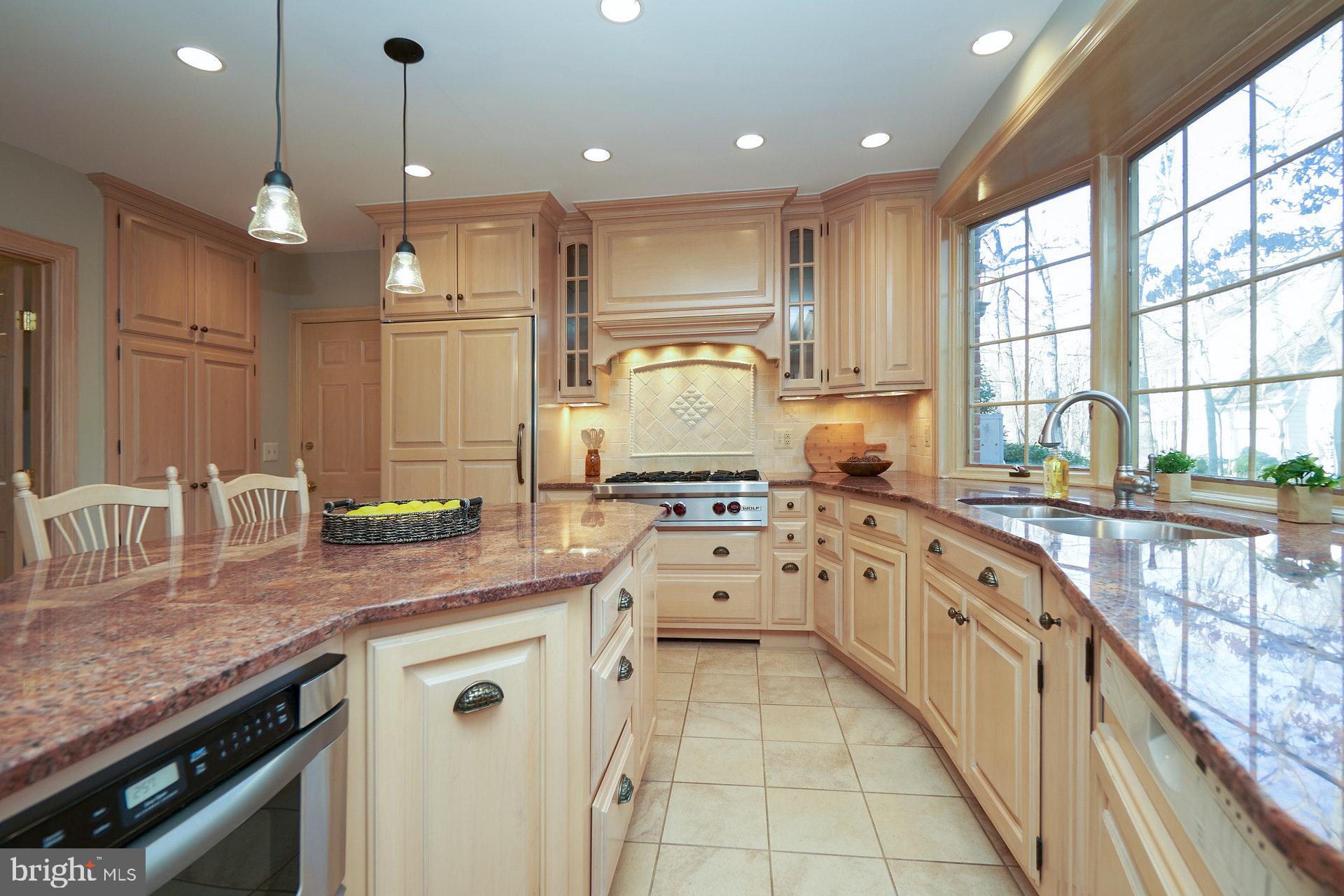 2307 Sawdust Road Vienna, VA 22181 - Photo 16 of 66 Granite countertops with Six Burner Wolf Range
