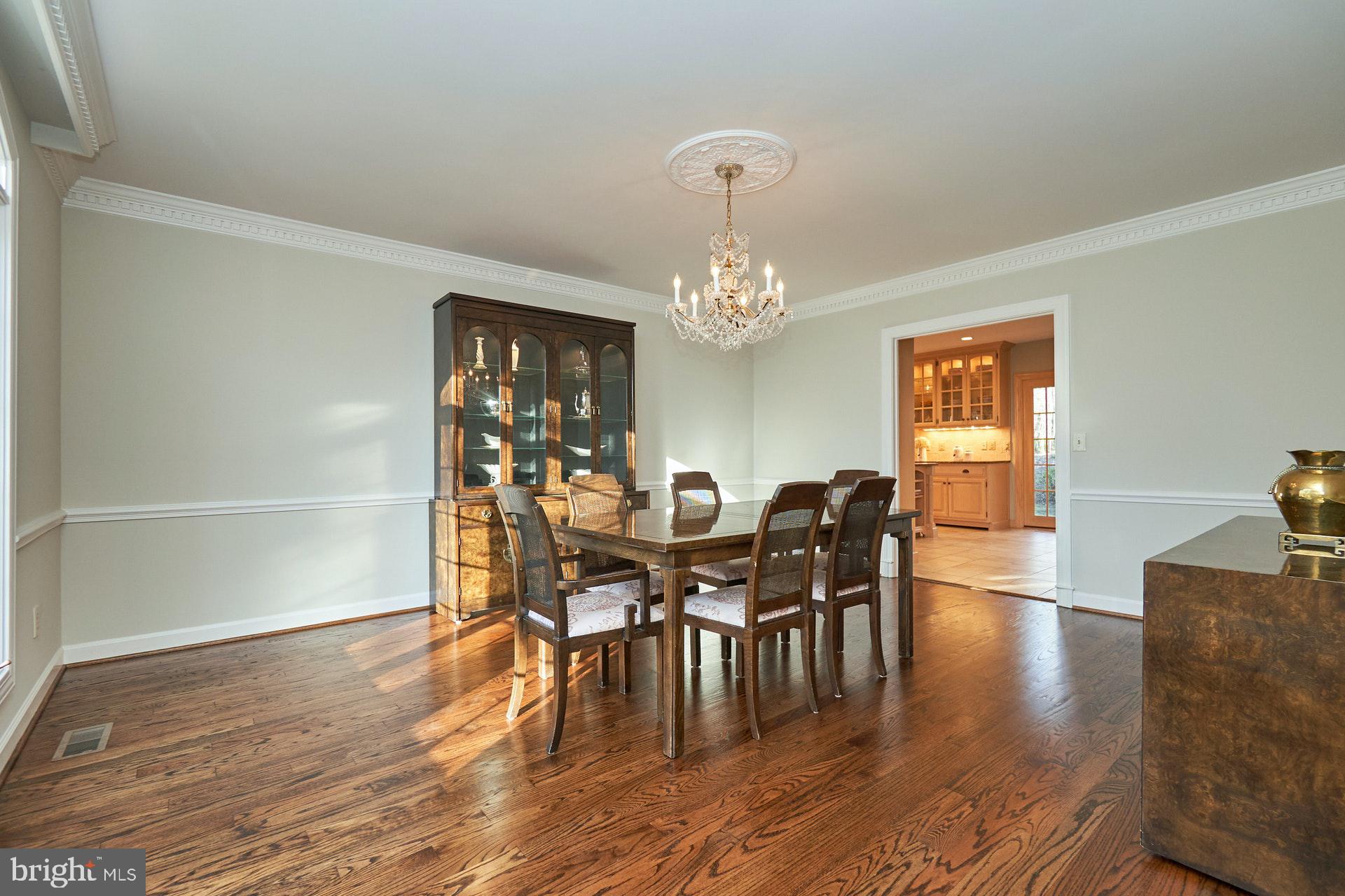 2307 Sawdust Road Vienna, VA 22181 - Photo 26 of 66 Chandelier in formal dining room