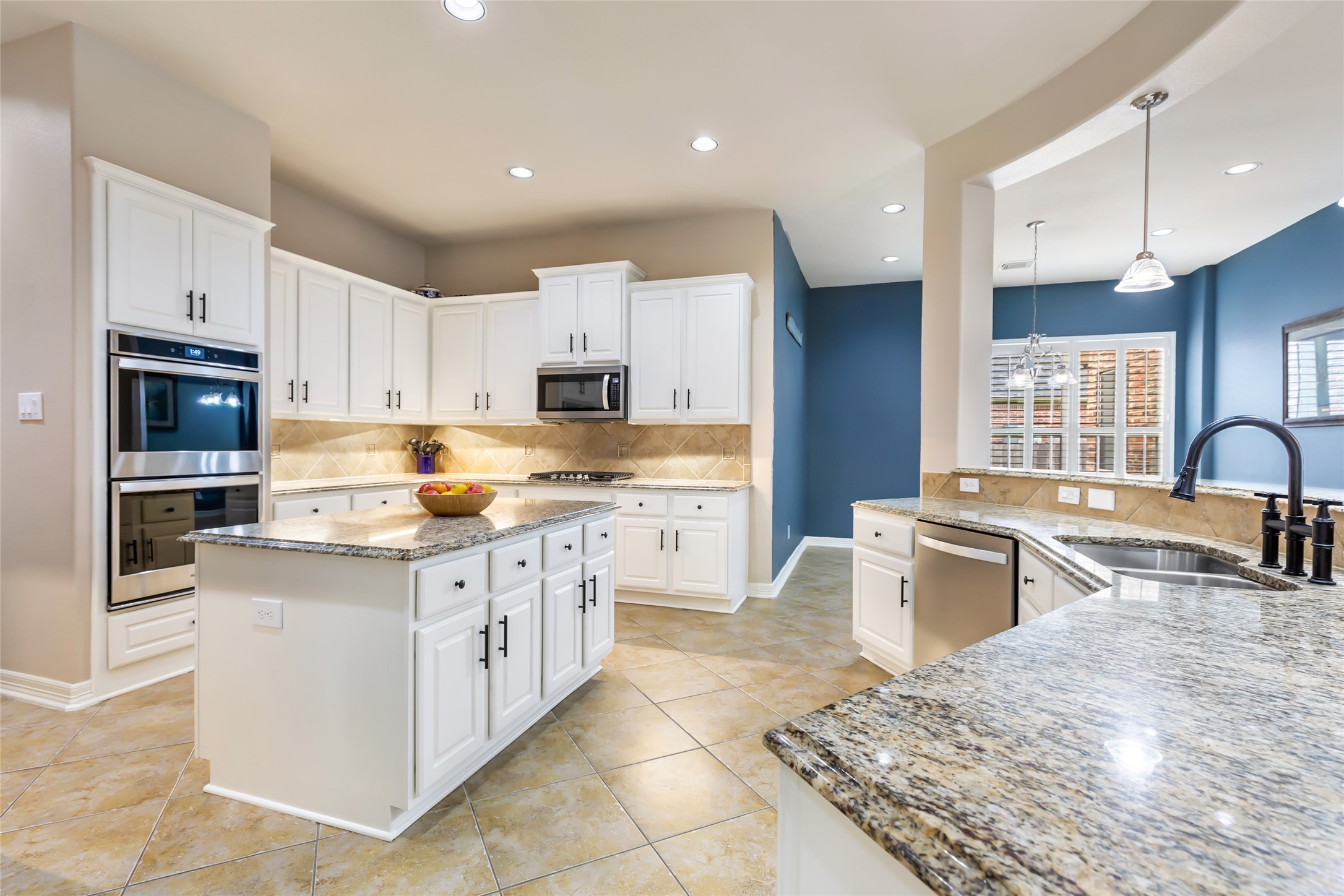 17302 Pipestone Point Court Humble, TX 77346 - Photo 15 of 50 BEAUTIFUL, thoughtfully designed kitchen with new appliances, abundant storage, large central island