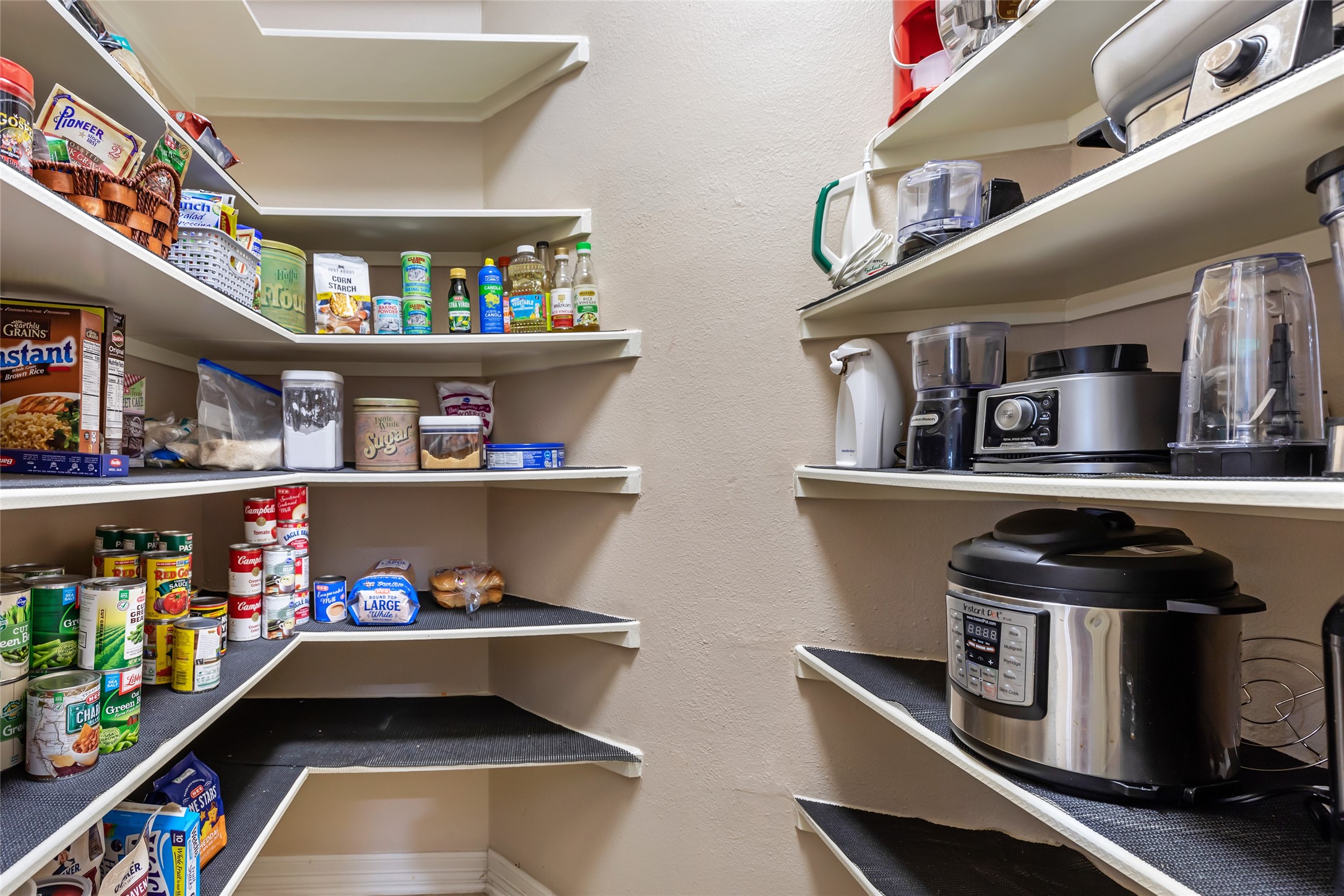 17302 Pipestone Point Court Humble, TX 77346 - Photo 19 of 50 Spacious pantry with shelves to the ceiling
