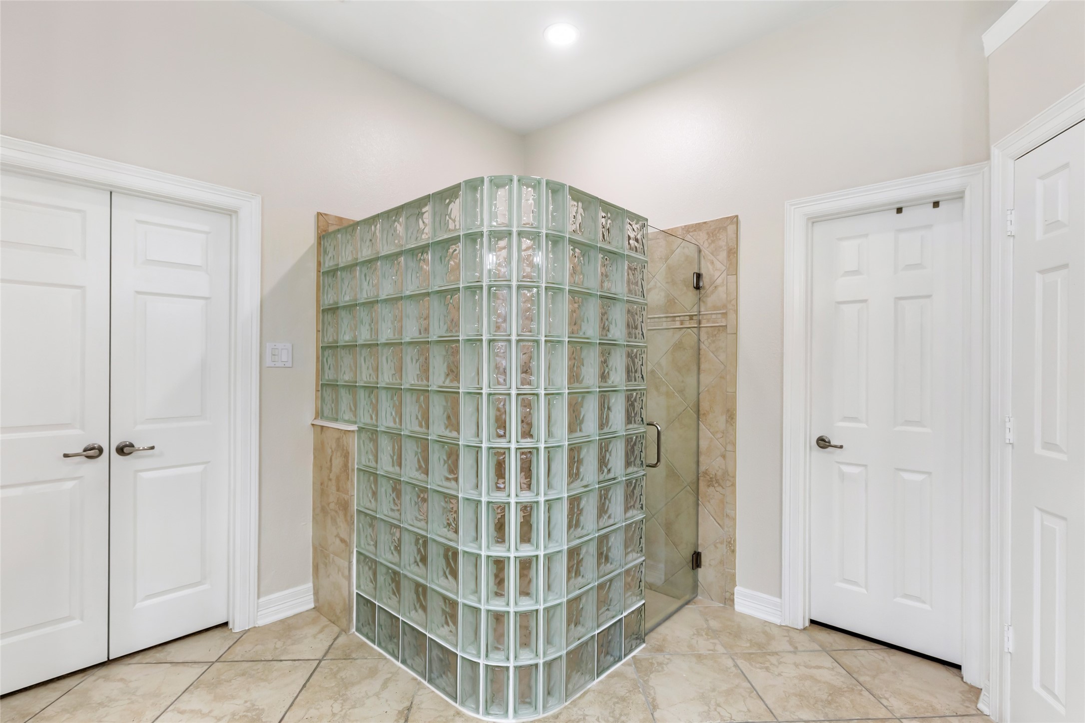 17302 Pipestone Point Court Humble, TX 77346 - Photo 33 of 50 Walk-in, block glass shower offers natural light with privacy