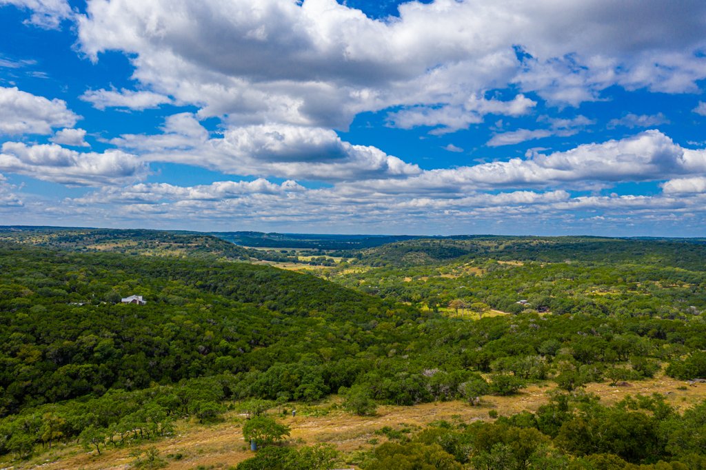 5771 Hilliard Road San Marcos, TX 78666 - Photo 1 of 10 a view of yard with mountain