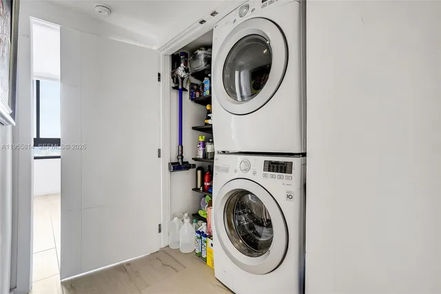 a utility room with dryer and washer