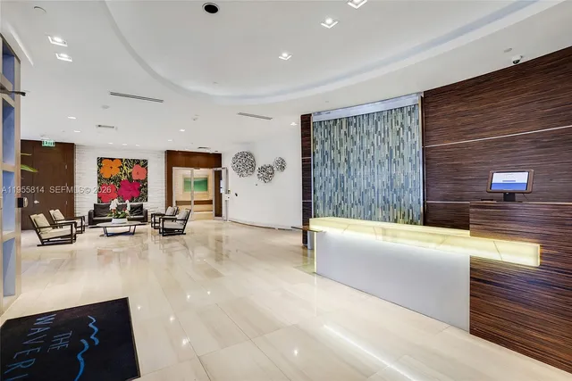 a view of a living room with furniture