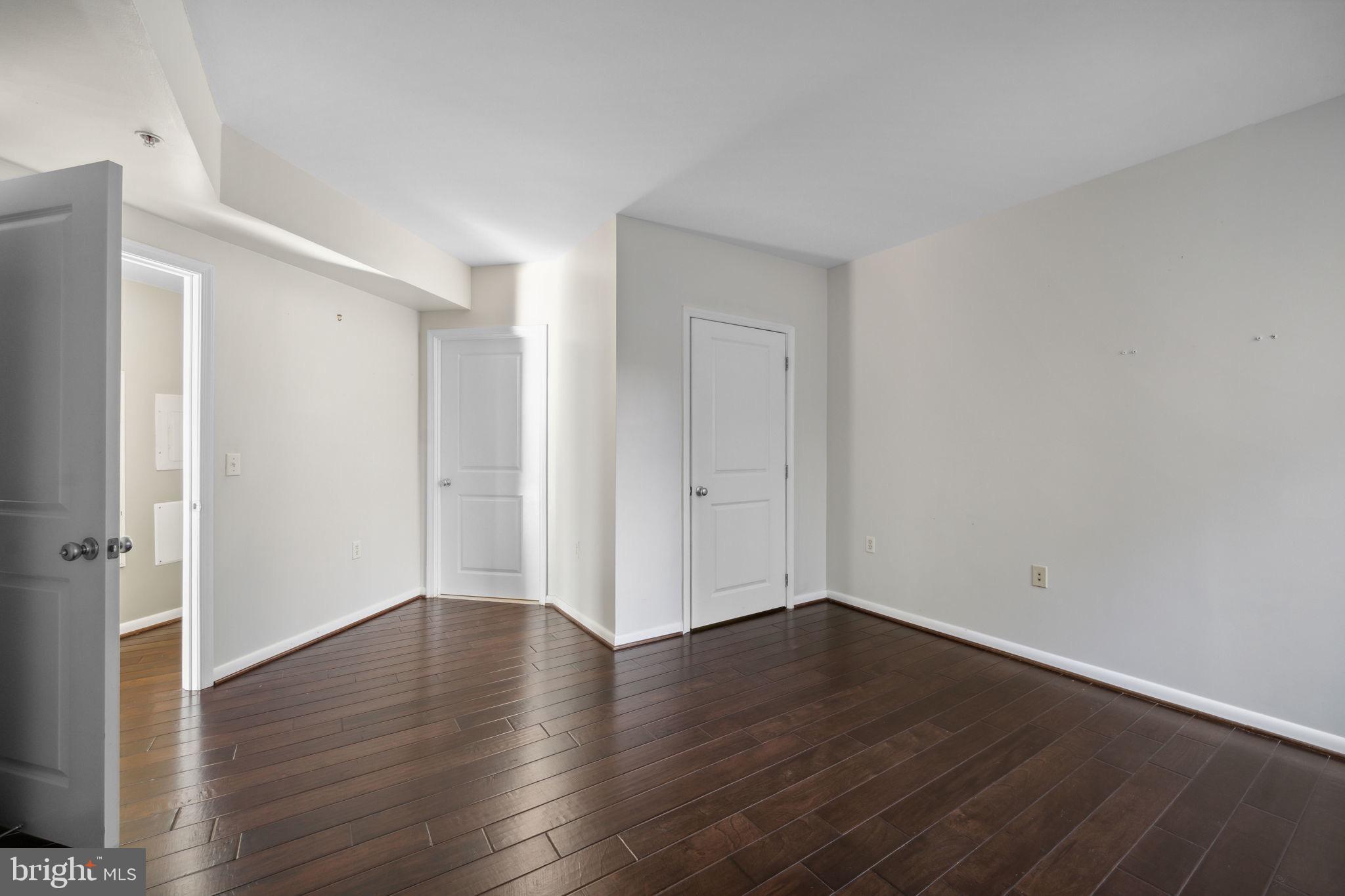 851 North Glebe Road, Unit 604 Arlington, VA 22203 - Photo 14 of 58 a view of a room with wooden floor
