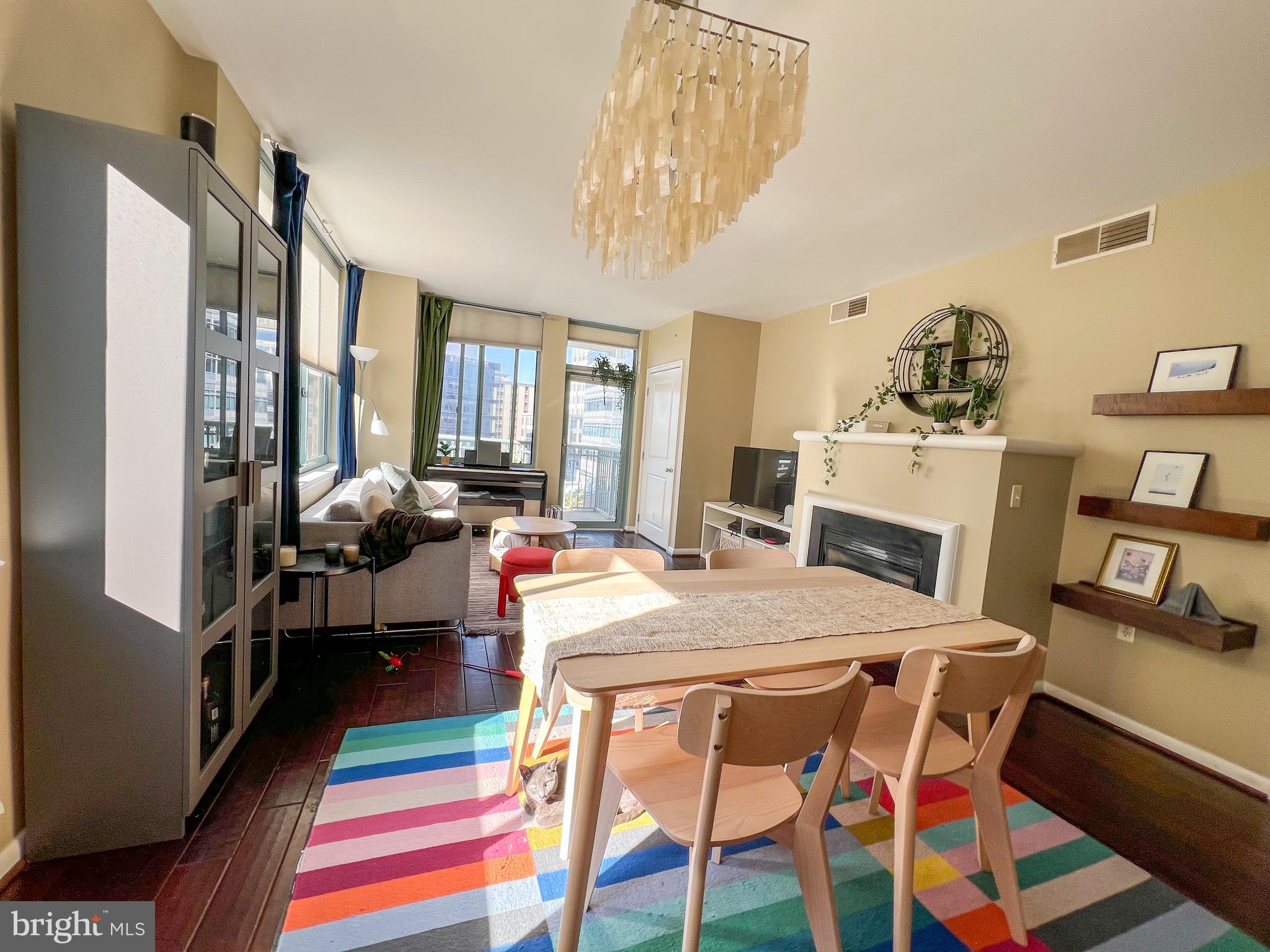 851 North Glebe Road, Unit 604 Arlington, VA 22203 - Photo 25 of 58 a view of a dining room with furniture and a chandelier
