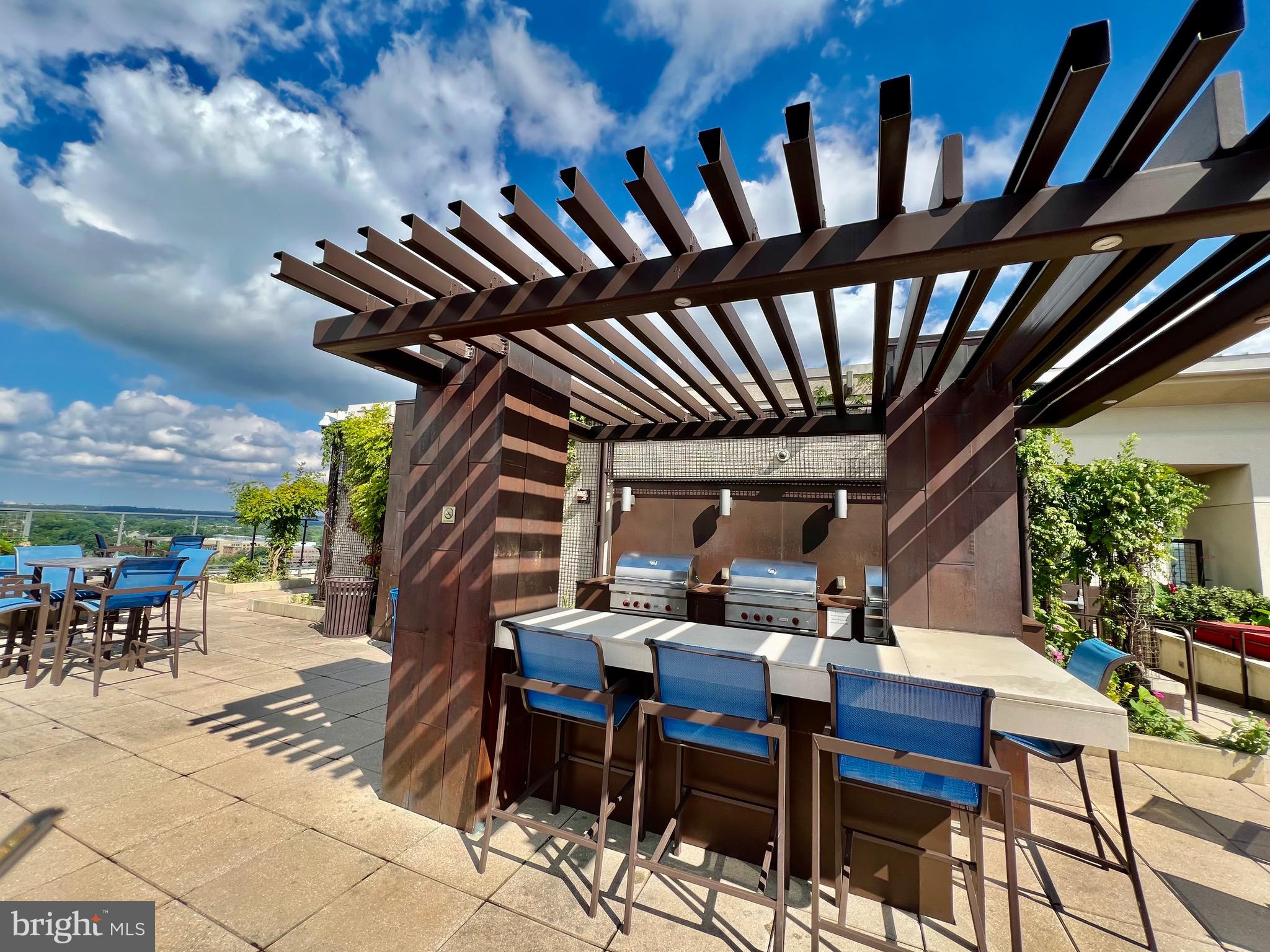 851 North Glebe Road, Unit 604 Arlington, VA 22203 - Photo 42 of 58 a view of a chairs and table in a patio