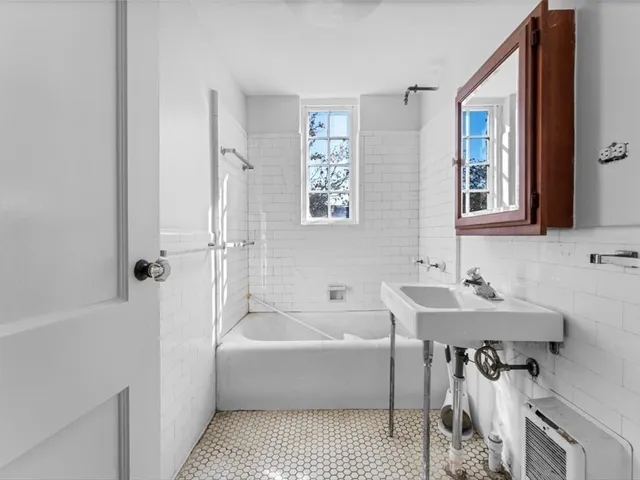 a bathroom with a sink and a bathtub