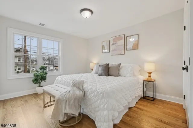 a bed room with a bed and a couch