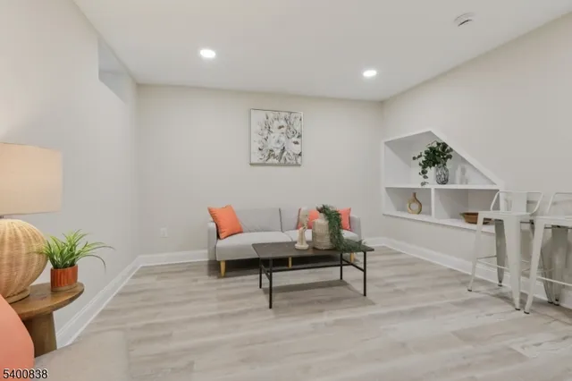 a workspace with furniture and wooden floor