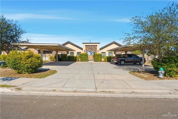 front view of a house with a street