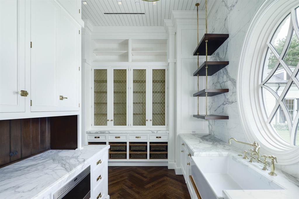 4606 Park Lane Dallas, TX 75220 - Photo 14 of 40 a bathroom with a sink and a mirror