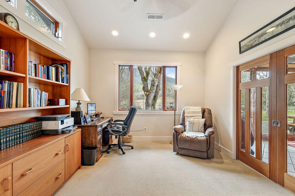 3828 Upper Applegate Road Jacksonville, OR 97530 - Photo 32 of 69 a living room with furniture and a window