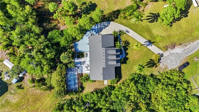an aerial view of residential house with an outdoor space
