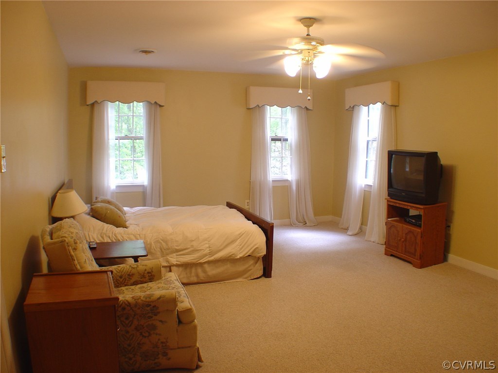 2220 Oakengate Lane Midlothian, VA 23113 - Photo 11 of 17 a bed room with a bed and a television