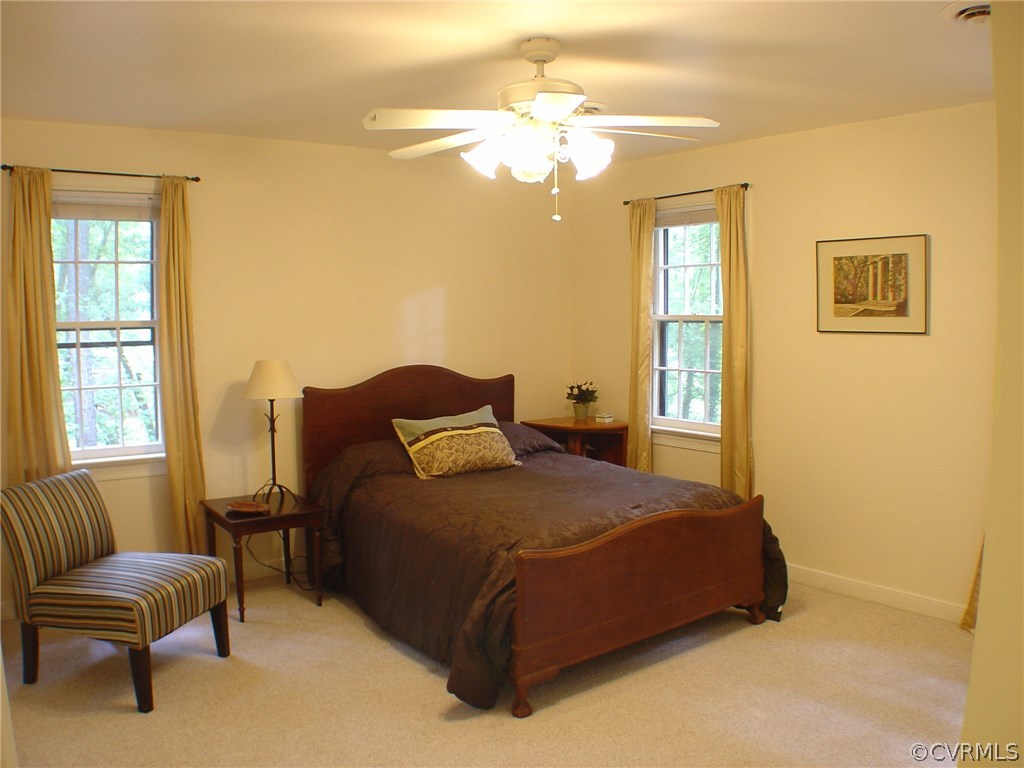 2220 Oakengate Lane Midlothian, VA 23113 - Photo 12 of 17 a bedroom with a bed and a couch