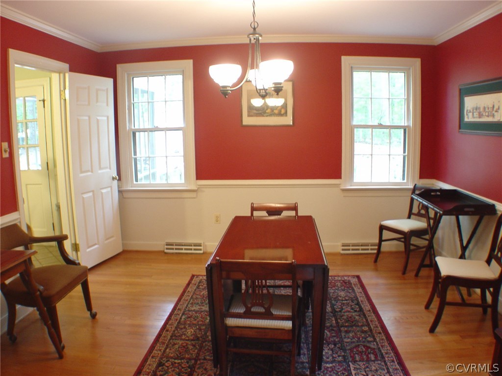 2220 Oakengate Lane Midlothian, VA 23113 - Photo 4 of 17 a dining room with furniture and window