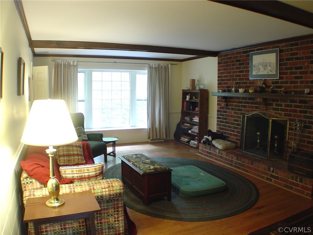 2220 Oakengate Lane Midlothian, VA 23113 - Photo 9 of 17 a living room with furniture and a fireplace