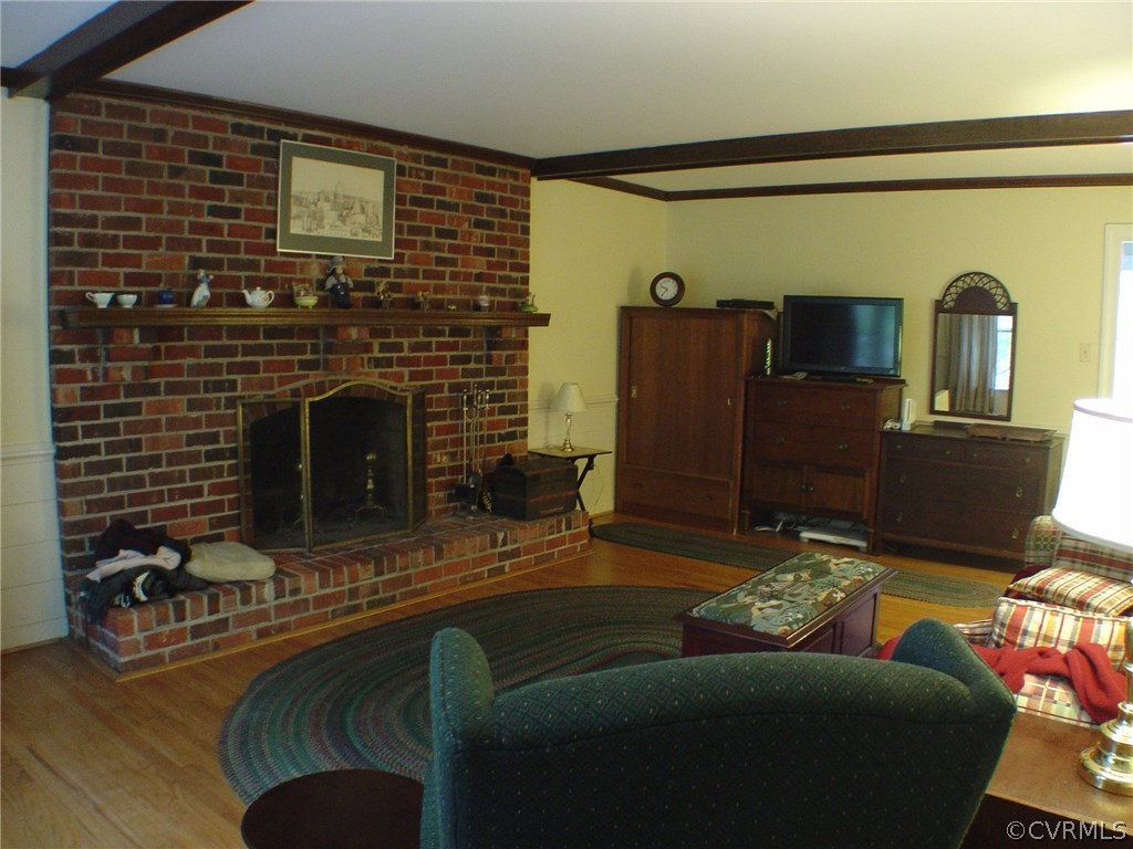 2220 Oakengate Lane Midlothian, VA 23113 - Photo 10 of 17 a living room with furniture and a fireplace