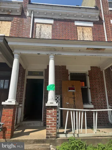 a front view of a house with garage
