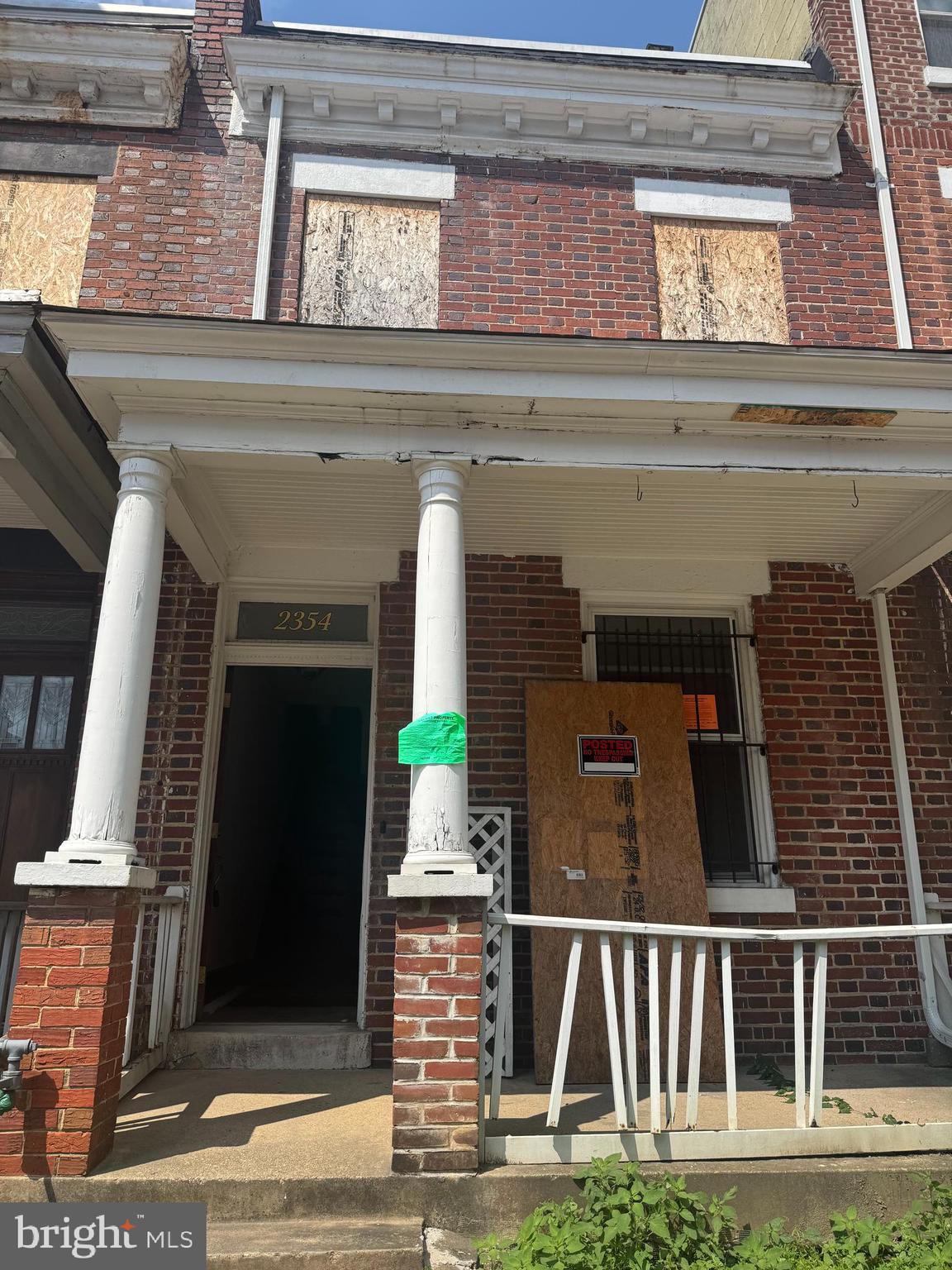2354 Champlain Street Northwest Washington, DC 20009 - Photo 1 of 5 a front view of a house with garage