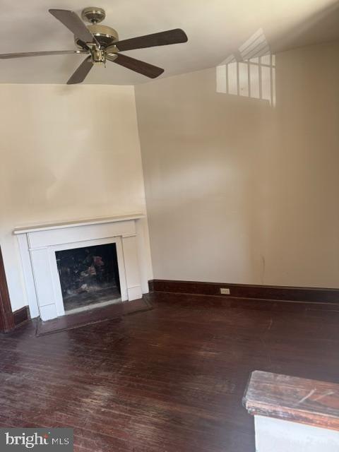 2354 Champlain Street Northwest Washington, DC 20009 - Photo 2 of 5 a view of a livingroom with a fireplace and a window