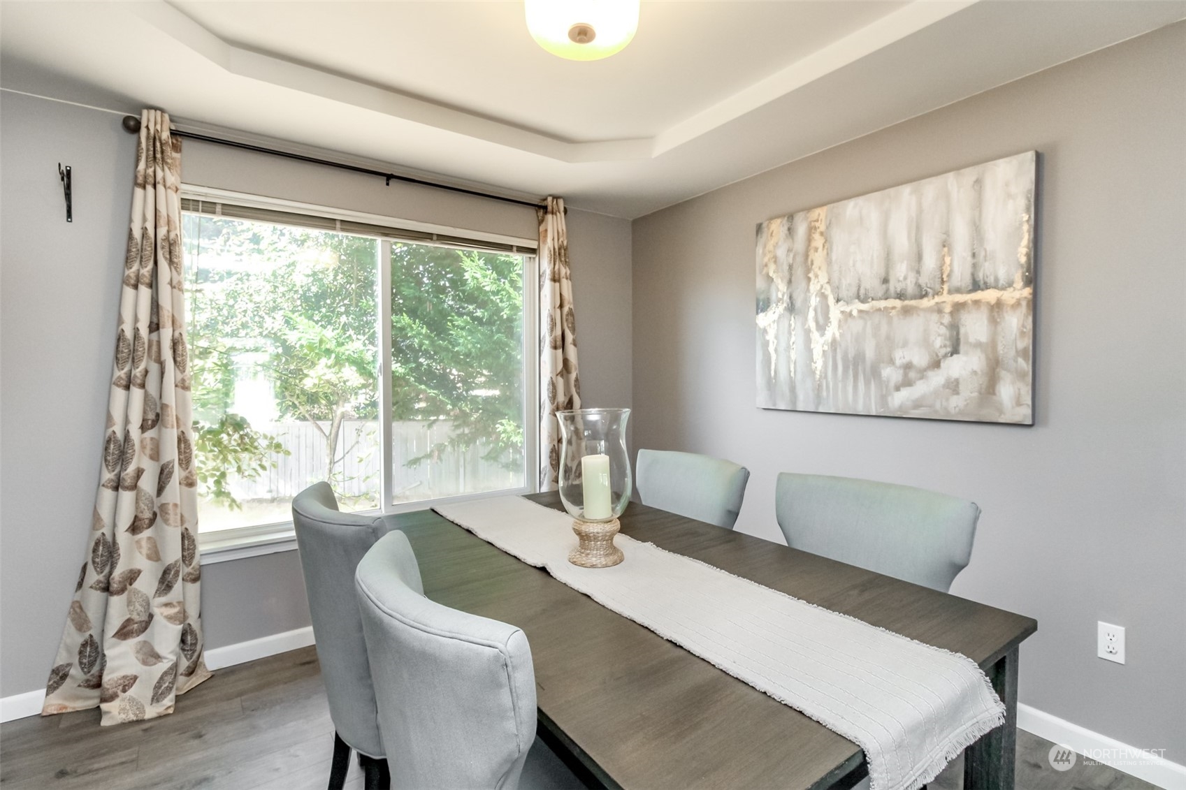 4609 Northeast 7th Place Renton, WA 98059 - Photo 11 of 30 a view of a dining room with furniture window and outside view