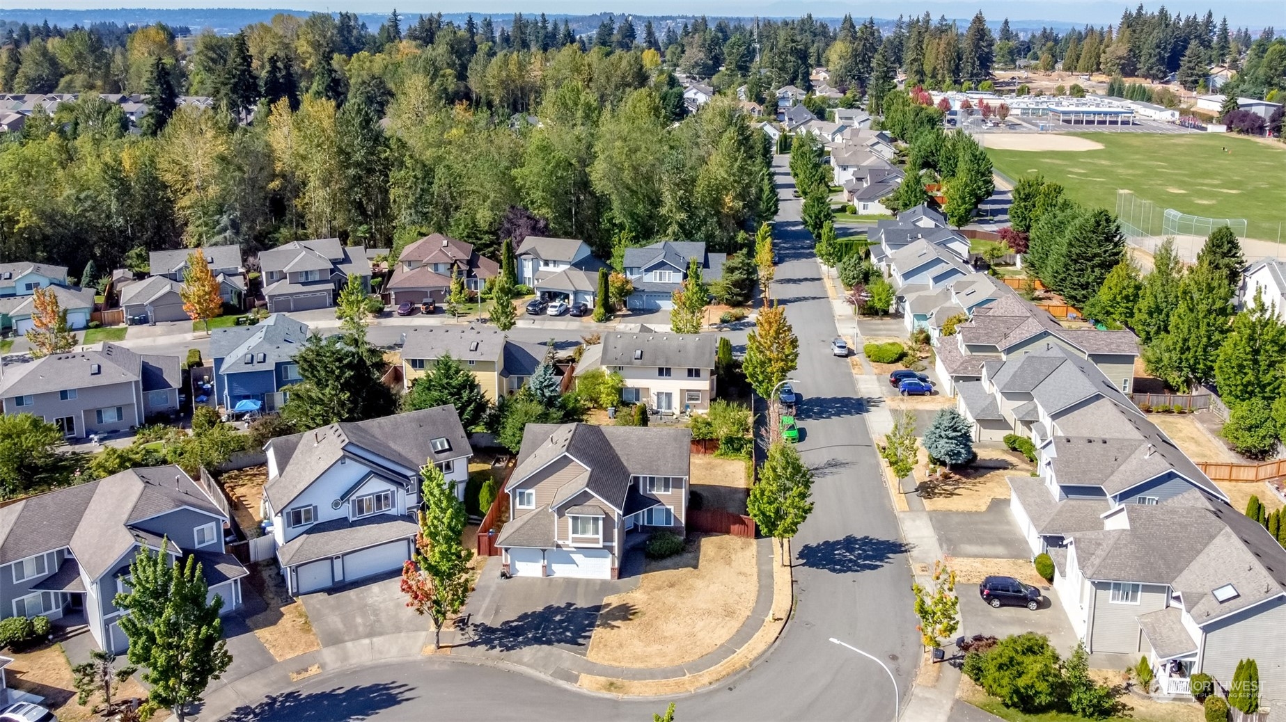 4609 Northeast 7th Place Renton, WA 98059 - Photo 26 of 30 a view of residential houses with outdoor space and street view